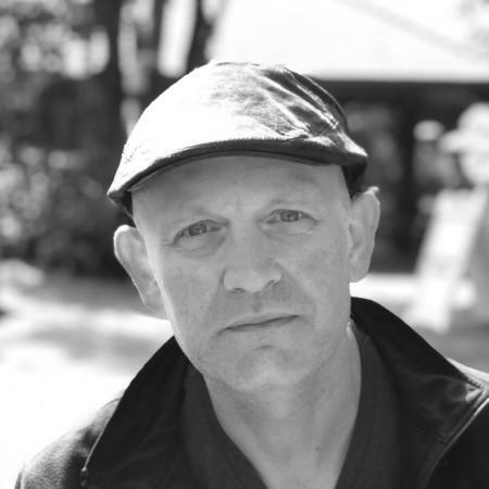 Headshot of Adam Brazier